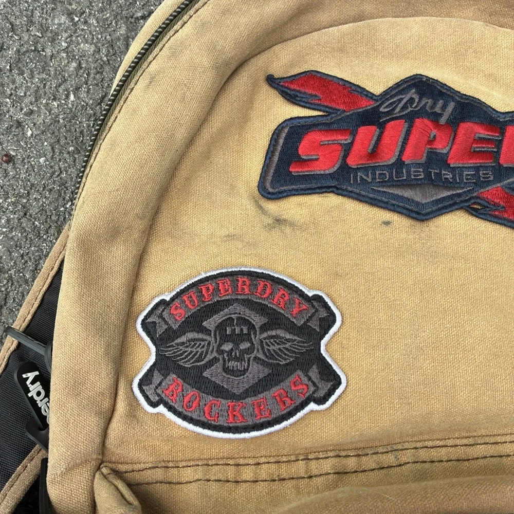 Superdry Small PATCHES Backpack Bag Brown 
